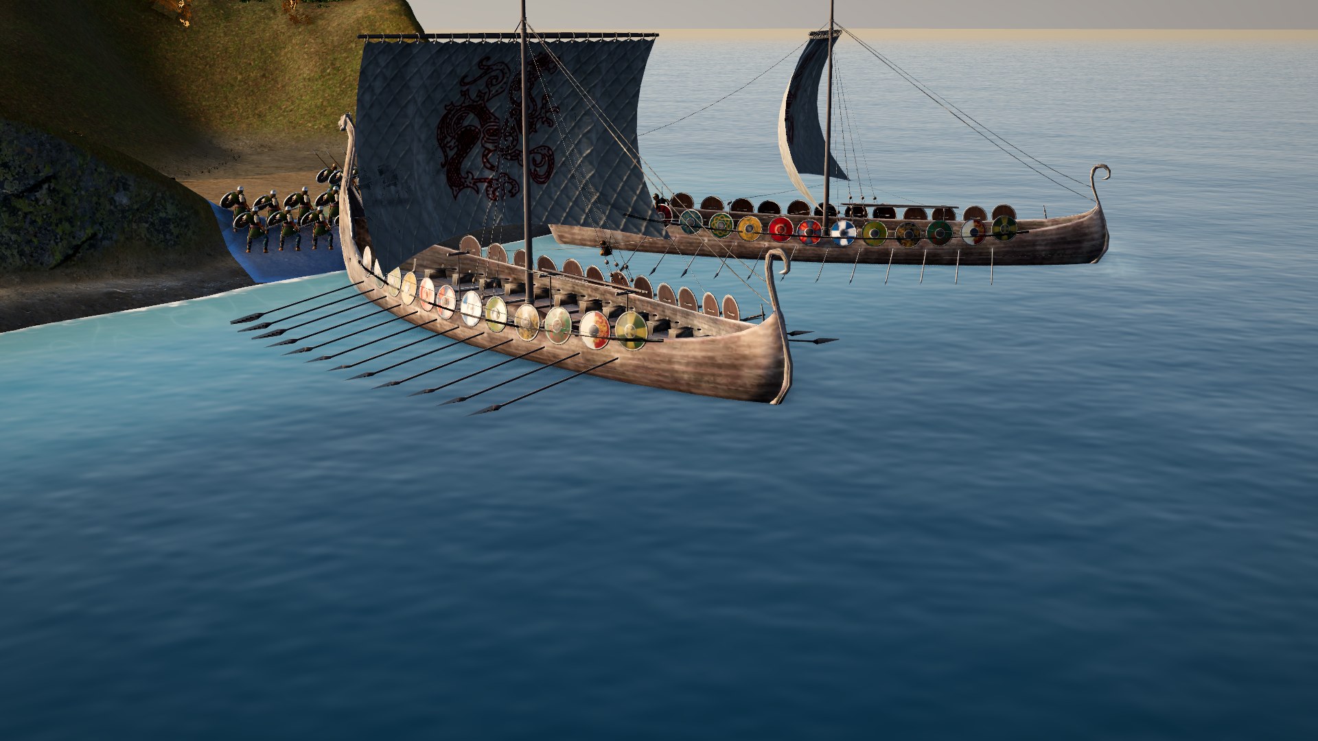 Two longships close on the shore, shields along their sides